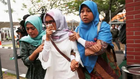 Reuters Relatives of passengers of Lion Air flight JT610 that crashed into the sea, arrive at crisis centre at Soekarno Hatta International airport near Jakarta, Indonesia, October 29, 2018.