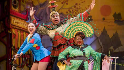 Getty Images Gemma Sutton, Clive Rowe and Tameka Empson in Aladdin at the Hackney Empire in 2018