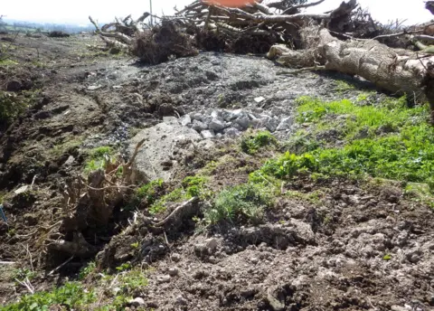 Department for Communities The site was cleared in April 2021