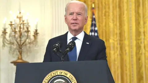AFP US President Joe Biden answers questions about the fuel pipeline cyber-attack during a speech about the economy at the White House