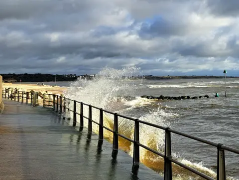 MarkieB This dramatic shot of the waves crashing against the promenade in Mudeford was caught on camera by MarkieB