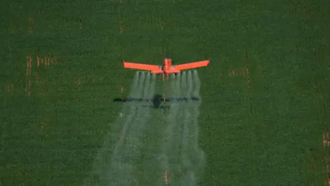 Greenpeace / Daniel Beltrá Spray plane in Brazil