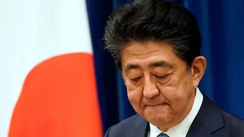 Shinzo Abe gestures during his press conference at the prime minister official residence in Tokyo on August 28, 2020.