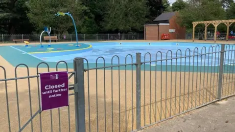 A children's paddling pool area in a public park