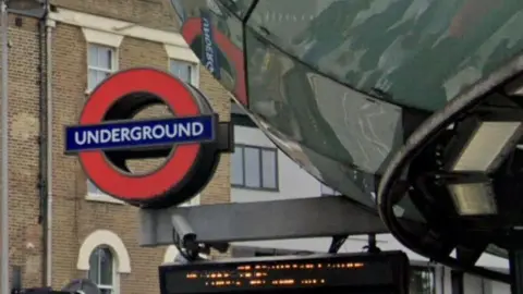 Google Outside Southwark Underground station, showing the red underground sign