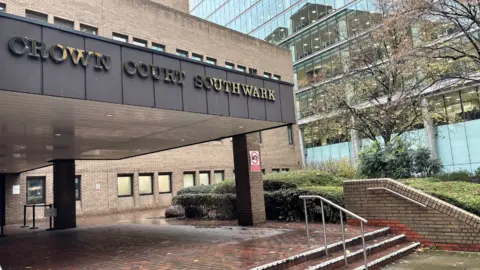 Southwark Crown Court exterior. It is a brown brick building.