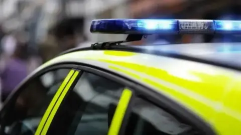 A stock picture of a police car.