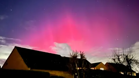 Meatsy Pink northern lights over Newtown Linford in Leicestershire