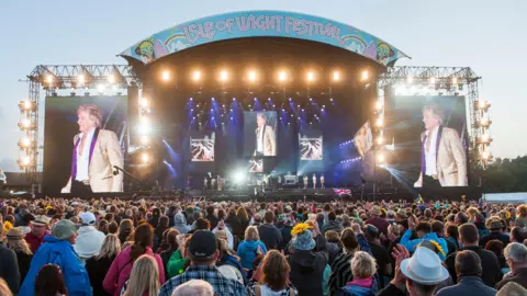 PA Media Rod Stewart performing at the Isle of Wight Festival.