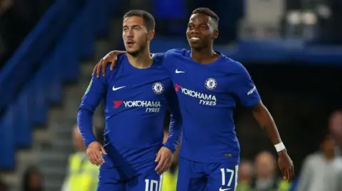 Charly Musonda with his arm around Eden Hazard while playing for Chelsea