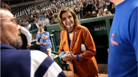 Getty Images Pelosi was clearing lobbying fellow Democrats at the congressional ball game