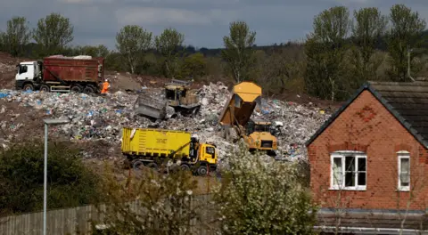 Reuters The quarry operating next to homes in Silverdale