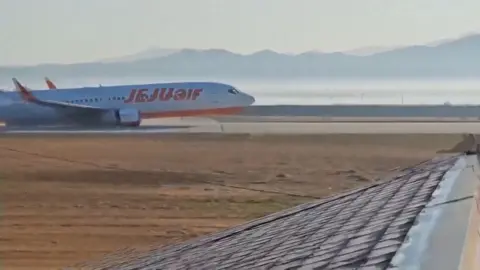 Jeju Air plane on runway 