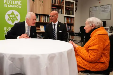 Getty Images The King meets Holocaust survivors at the Jewish Community Centre in Krakow