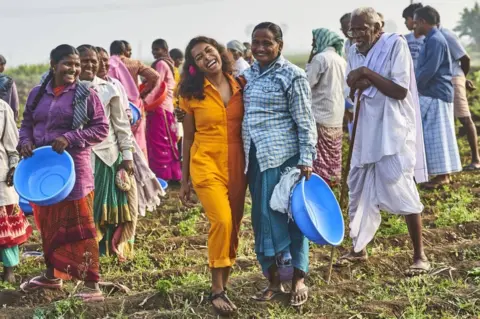 Diaspora Co Sana Javeri Khadri and farm workers in India