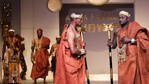 EPA Models presents creations by Ivorian designer Miss Zahui during the Afrik Fashion Show in Abidjan 07/10/2017