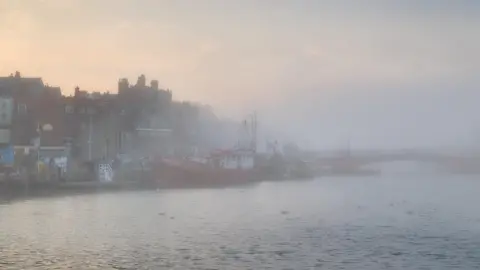 David/View Yorkshire Thick mist and sea fret during Whitby Regatta