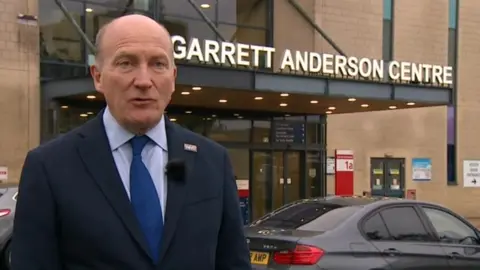 Martin Giles/BBC Nick Hulme outside emergency department at Ipswich Hospital