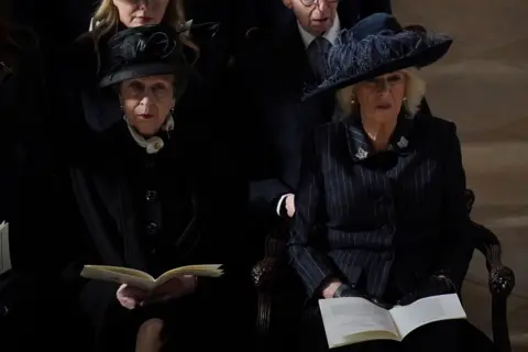 PA Media Anne, the Princess Royal, and Queen Camilla at the memorial service