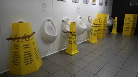 Getty Images Urinals taped up