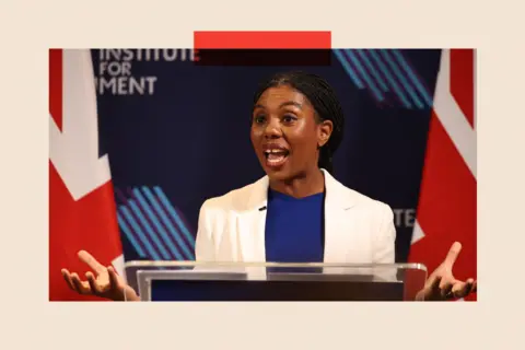 EPA/ Shutterstock Kemi Badernoch delivers a speech at the Institute for Government in London