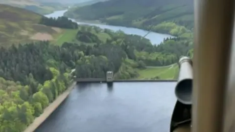 Tiger Moth over Derwent Dam