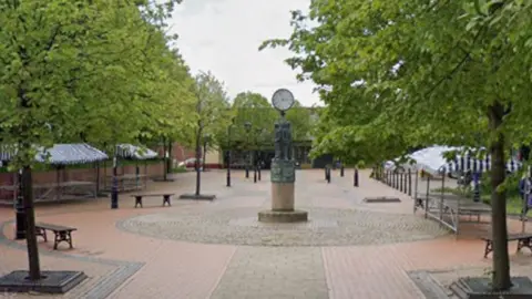 Google Street view of the clock statue featuring three industrial workers commemorating Staveley's mining and engineering heritage.