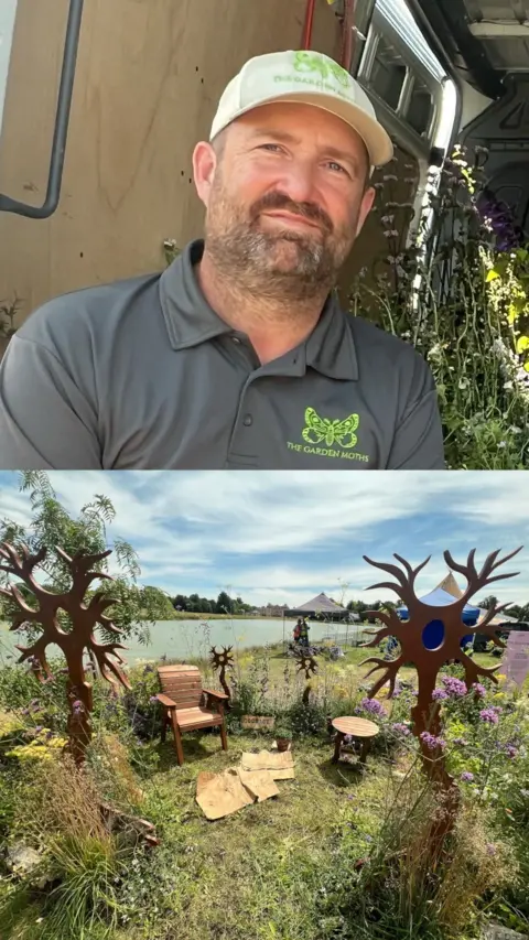 The top half of the image features Gavin Moth. He has a brown beard with flecks of grey. He is wearing a white cap and a grey polo shirt. Both have a bright green butterfly logo on and the words 'The Garden Moths'. The bottom half of the image features a show garden. There are two large silhouette tree sculptures at the left and right hand side of the image and two more smaller ones in the centre at the back of the garden. There is a circle of tall grasses and plants with pink, white and yellow flowers. In the centre of the circle there is a lawn with a wooden chair and table on it.