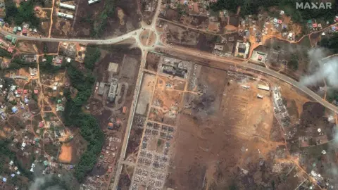 Satellite image ©2021 Maxar Technologies Satellite image of Bata military complex destroyed