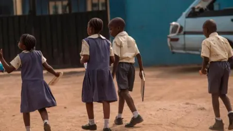Getty Images Primary school students of Bethel school in Lagos, Nigeria wearing their uniforms