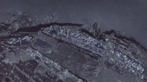Air/Sea Heritage Foundation and Deep Sea Vision Close-up image of the Clipper Endeavor wreckage showing the Pan Am logo
