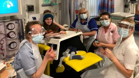 Bingham family Ariel with the nursing team