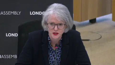 London Assembly Deputy mayor Sophie Linden speaking to the committee in front of a black background