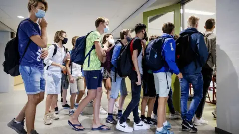 EPA Students wearing face masks at a school in the Netherlands