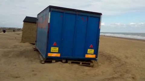 Sutton on Sea Beachcare Metal container on beach