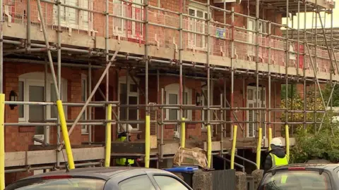 Work being carried out to retrofit one of 150 homes in Northampton