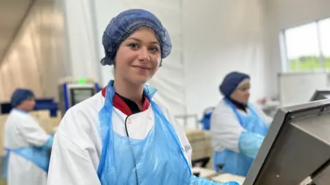 A woman in a factory