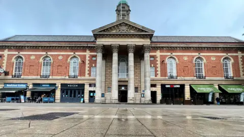 DJ McLaren/BBC Image shows Peterborough's red brick town hall on Bridge Street. 