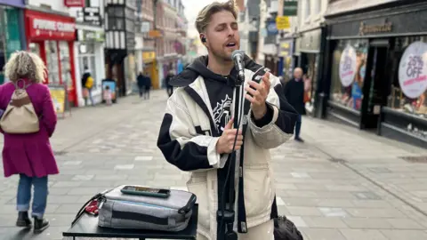 Jason Allan busking on the street