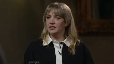 Musician Self Esteem looks to the right