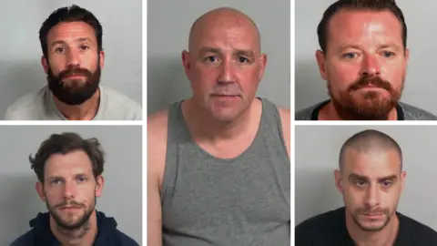Essex Police A composite image of Stuart Williams, Dean Smith, Lee Gower, Shaun Thompson and Martin Peagram. They are all in police custody and look glum.