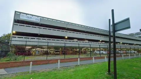 A three-storey concrete car park