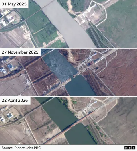 Three satellite images showing the construction of the bridge on 31 May 2025, 27 November 2025 and 22 April 2026
