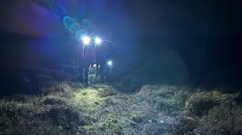 NNPRT The team walking down the hill