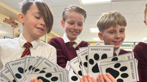 Clare Community Primary School students with their Doggy Cards
