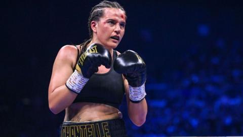 Chantelle Cameron in a boxing stance against Katie Taylor
