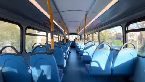 Empty top deck of bus