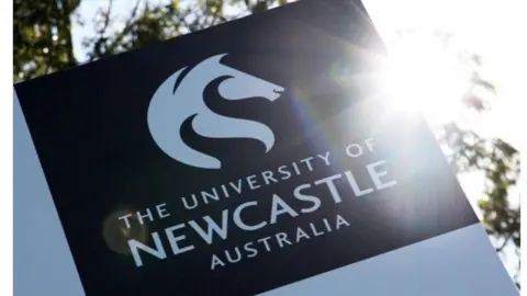 FACEBOOK/THE UNIVERSITY OF NEWCASTLE, AUSTRALIA A sign for the University of Newcastle Australia