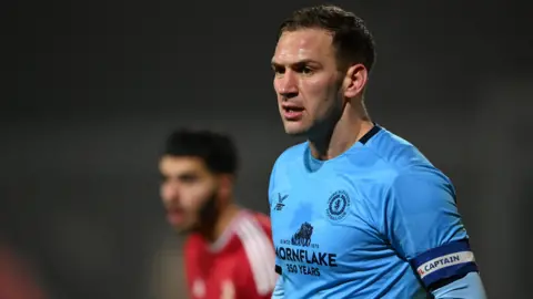 Mickey Demetriou in action for Crewe