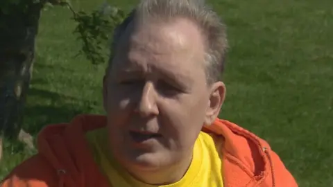 Paul Meisak and his wife